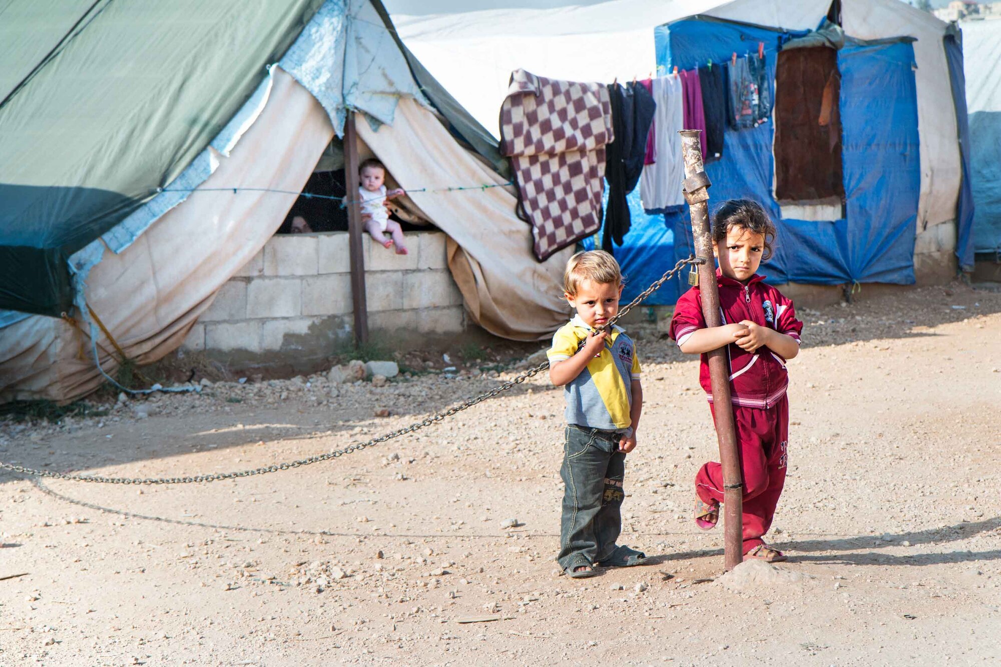 Syriske flyktningbarn i Libanon Syriske flyktningbarn i flyktningleir i Libanon