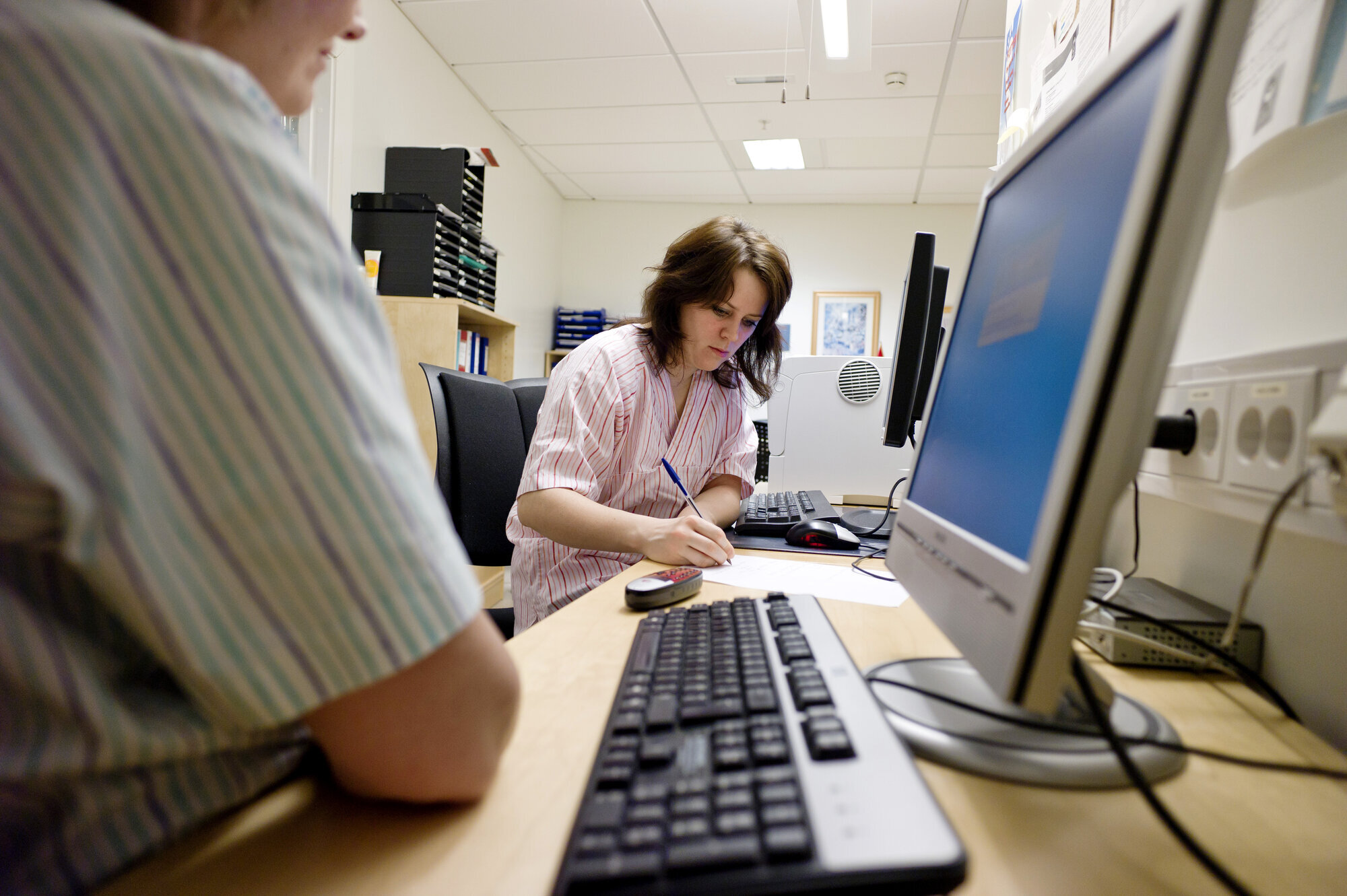 Pleieplan Sykepleiere som jobber med dokumentasjon