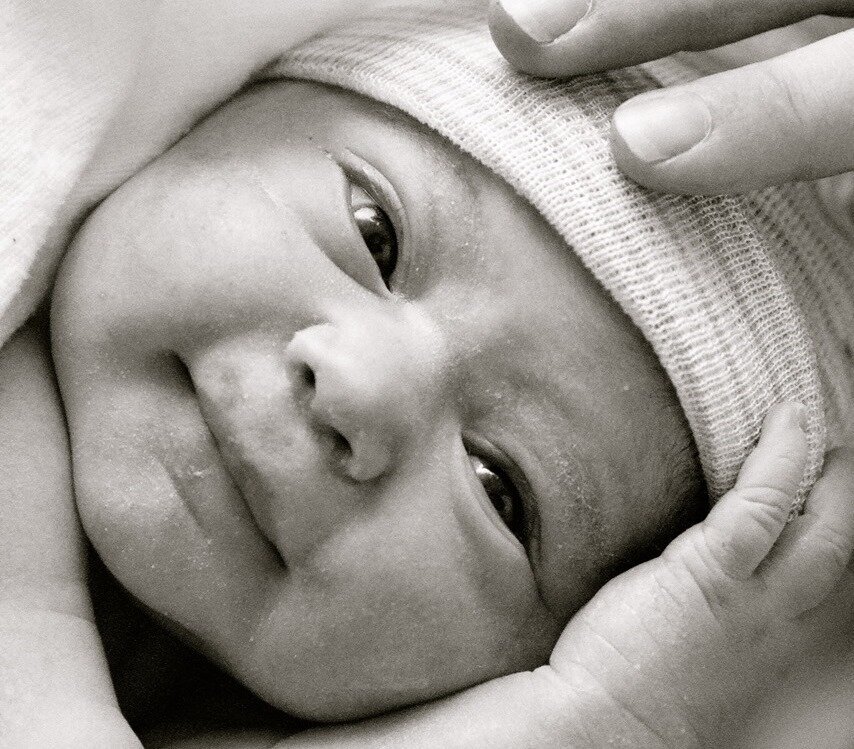 Baby Bildet viser en nyfødt baby.