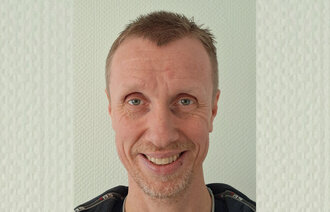 Bildet viser et portrett av Henning Homme